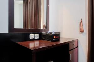 Comfort Living Studio Apartment at Mangga Dua Residence By Travelio