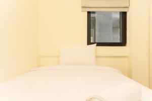 Comfortable 2BR with Study Room at Meikarta Apartment By Travelio