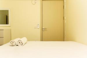 Comfortable 2BR with Study Room at Meikarta Apartment By Travelio