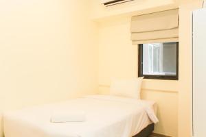 Comfortable 2BR with Study Room at Meikarta Apartment By Travelio