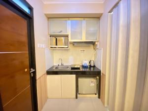 Cozy and Stylish 1BR Apartment at Gateway Pasteur By Travelio
