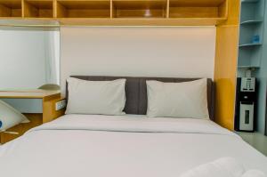 Elegant Studio Pacific Garden Apartment near Alam Sutera By Travelio