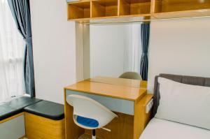 Elegant Studio Pacific Garden Apartment near Alam Sutera By Travelio