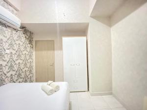 Pleasant 2BR Apartment at Newton Residence By Travelio