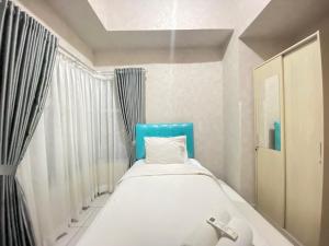 Pleasant 2BR Apartment at Newton Residence By Travelio