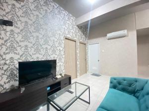 Pleasant 2BR Apartment at Newton Residence By Travelio