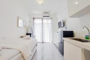 Good Deal and Comfortable Studio at Sky House BSD Apartment By Travelio