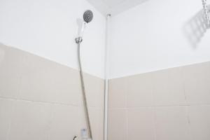 Restful and Simply Studio Apartment Green Palm Residence By Travelio