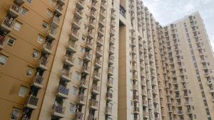 Restful and Simply Studio Apartment Green Palm Residence By Travelio