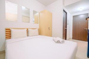 Best Price Studio Room Transpark Cibubur Apartment By Travelio