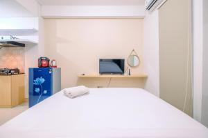 Best Price Studio Room Transpark Cibubur Apartment By Travelio