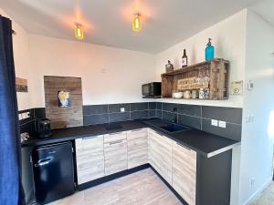 Appartements L echappee Remoise, jacuzzi proche caves champagne : photos des chambres