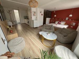 Appartements Suite romantique boheme chic avec bain a remous : photos des chambres