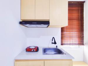Cozy Studio at 9th Floor Paltrow City Apartment By Travelio