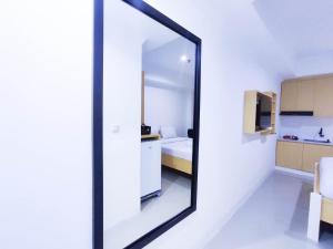 Cozy Studio at 9th Floor Paltrow City Apartment By Travelio
