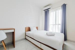 Comfortable and Homey Studio Apartment at Sky House Alam Sutera By Travelio