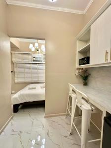 Studio Two Condominium, Alabang AMBER -Fiber WI-FI Netflix ready