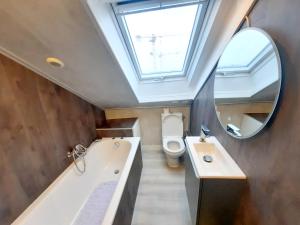 Appartements L-Opale - Sauna et Jacuzzi : photos des chambres