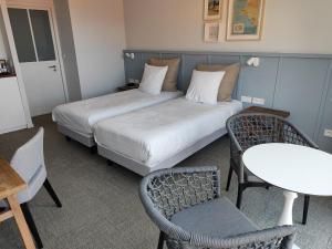 Hotels Eco-Domaine La Fontaine - HOTEL-SPA - Plage de la Fontaine aux Bretons : photos des chambres