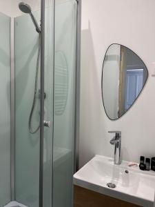 Appartements Dalikyda Le Ptit Nid Stationnement Gratuit : photos des chambres