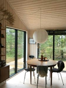 Summer House On Natural Grounds Among Pine Trees