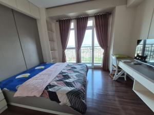 Apartemen Puri Orchard Lanis Transit Tower CH