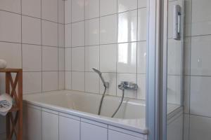 Inselblume 55 - Ferienwohnung in der Strandburg mit Hund