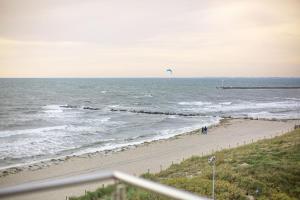 Inselblume 18 - Ferienwohnung mit Meerblick & Galerie in der Strandburg