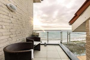 Inselblume 18 - Ferienwohnung mit Meerblick & Galerie in der Strandburg