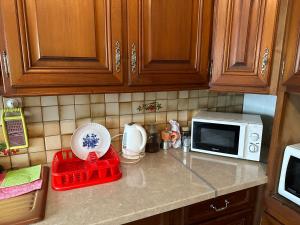 Sejours chez l'habitant 4 chambres privees dans un pavillon chaleureux : photos des chambres