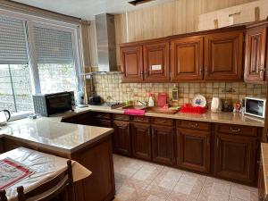 Sejours chez l'habitant 4 chambres privees dans un pavillon chaleureux : photos des chambres