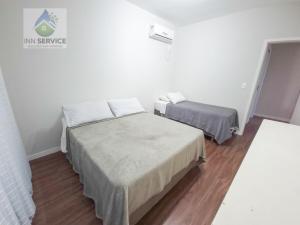 I11-Ap térreo a 500 m da praia com ar e Wi-Fi