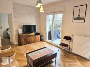 Magnifique 2 pièces avec terrasse et grand jardin