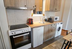 Cozy Nest, One-Bedroom Flat