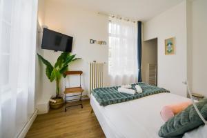 Appartements Les Carnaux- Parking - Terrasse : photos des chambres