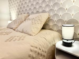 Appartements Les rondins , T3 proche gare TGV : photos des chambres