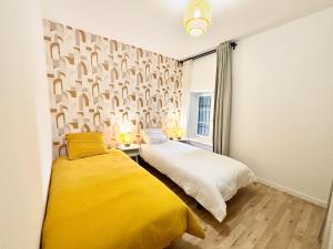 Appartements Les rondins , T3 proche gare TGV : photos des chambres