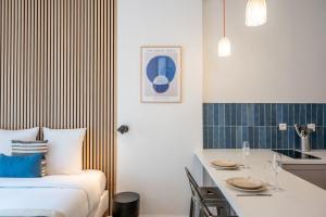 Appartements Studio confortable proche metro et commerces : photos des chambres
