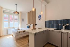 Appartements Studio confortable proche metro et commerces : photos des chambres