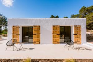 Villa Es Pujolet Renovada 100 porcien Un refugio de paz en el corazón de Ibiza Piscina AC Diseño Tranquilidad El verdadero Ibiza