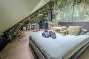 Appartements La Suite Jungle - High Tech - NETFLIX - WIFI tres Haut Debit : photos des chambres