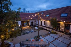 Appartements La Ferme 1802 : photos des chambres