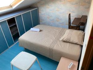 Sejours chez l'habitant 4 chambres privees dans un pavillon chaleureux : photos des chambres