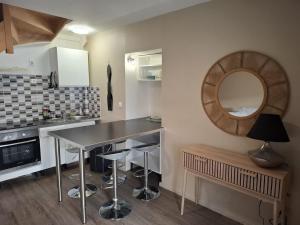 Appartements Duplex en centre-ville : photos des chambres