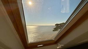 Appartements Plein Sud, appartement vue baie, acces direct plage : photos des chambres
