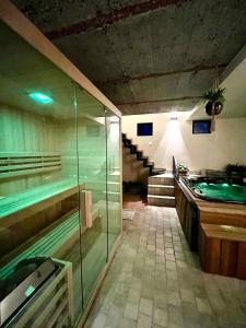 Appart'hotels Suite & SPA a La Ferme 1802 : photos des chambres