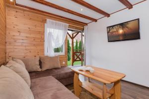 Bursztynek zadaszony i podgrzewany basen - 3 sypialnie 6-8 osób