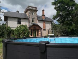 Maisons de vacances Domaine de l-Ile: Maison historique avec piscine et Wi-Fi - FR-1-586-57 : photos des chambres