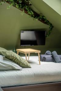 Appartements La Suite Jungle - High Tech - NETFLIX - WIFI tres Haut Debit : photos des chambres