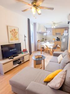 T3 clim, TV, ART, familial, 50m du port, cuisine équipée et jeux de société